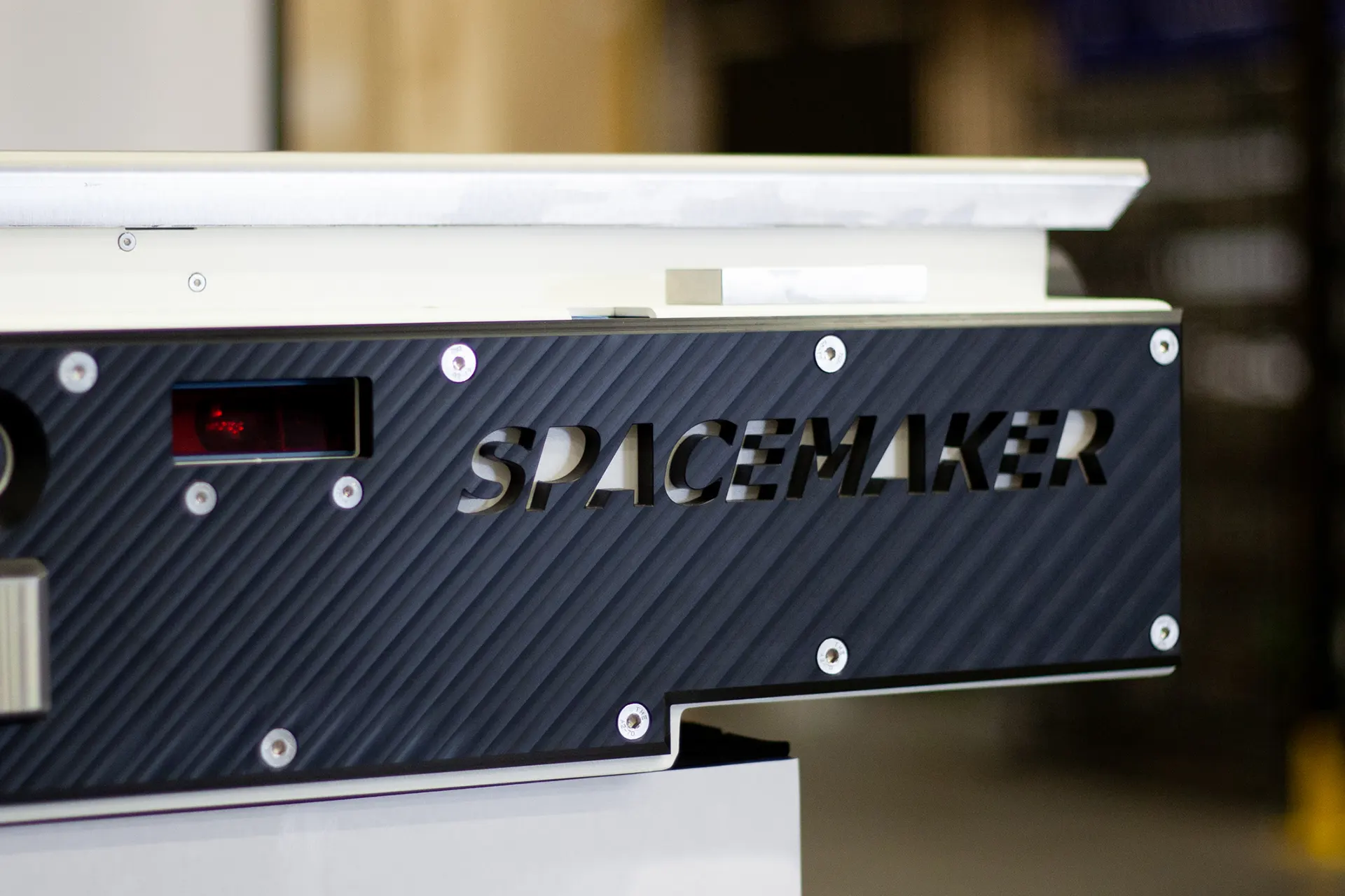 Spacemaker pallet shuttle in a high-density warehouse rack