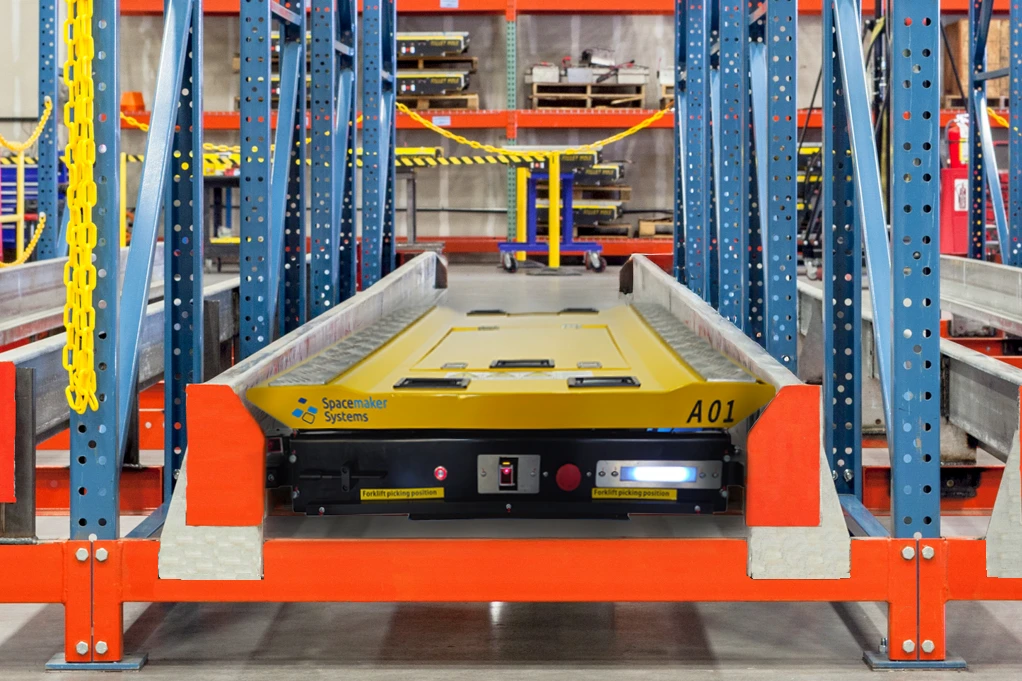 DualAxis pallet shuttle in rack